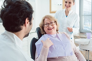 Woman smiles with dental implants in Worcester