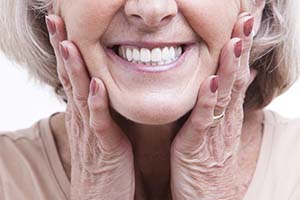Closeup of smiling woman with dental implants in Worcester