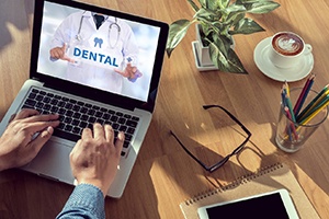 Using computer to research dental benefits information