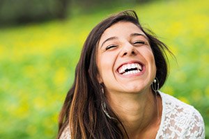 Woman smiling thanks to gum grafting in Worcester