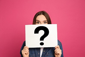 Woman with questions about surgical periodontal treatment