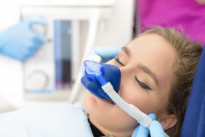 a woman sedated for a dental procedure